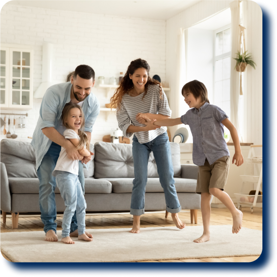 Family dancing in living room