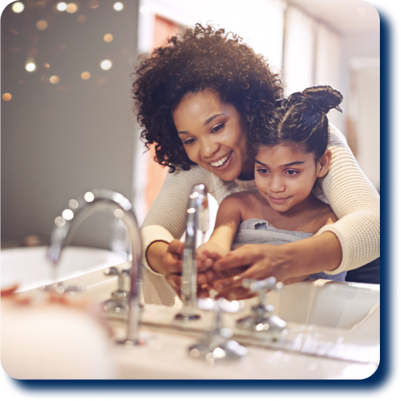 Mother Daughter washing hands